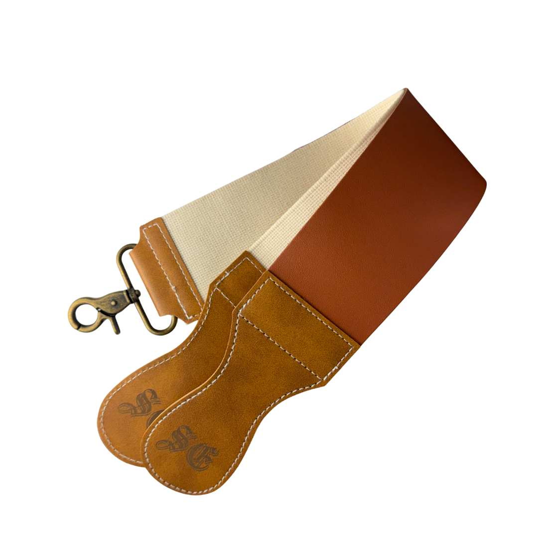 Tan razor strop folded to show its pale reverse, stitched handles and hanging clip
