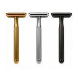 Gold, silver and black Double-Sided Safety Razor V2 models displayed upright