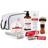 Safety razor kit products arranged with a white toiletry bag